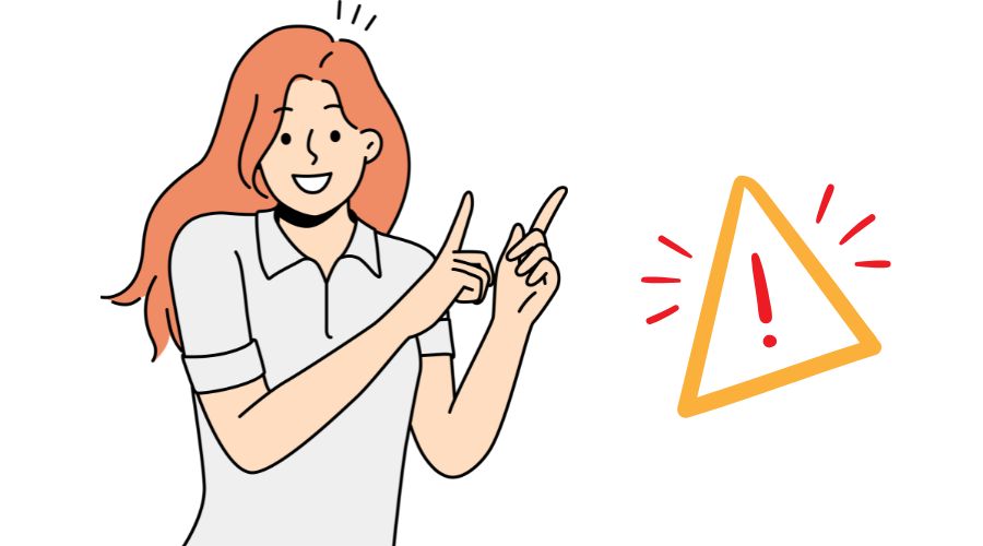 人差し指を立てている女性